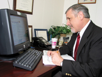 Craig Kalman works at his desk