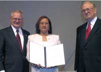 Egda accepts the Puerto Rico Presidential Award for Excellence in Science and Mathematics Teaching which was granted by the White House and National Science Foundation.
