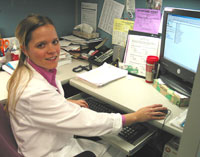 Hanna does administrative work at her desk.