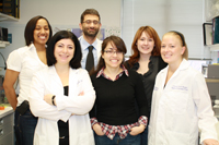 Ilias Alevizos poses with his colleagues in the lab.