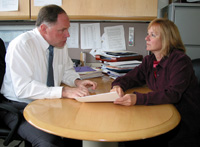 Jean Jenkins meets with a Genetic Counselor to work on a collaborative research project.