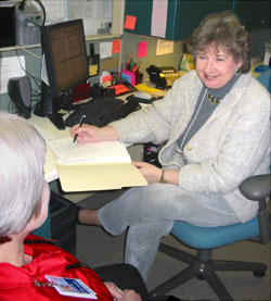 Linda Doty talks with a colleague at NIAAA.