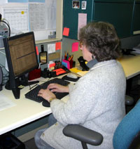 Linda Doty responds to e-mail in her office.