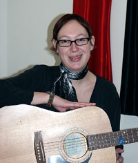 Manon playing the guitar