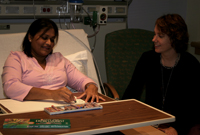 Megan has an art therapy session with a patient.