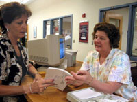 Robin Meckley working at the reference desk in the Scientific Library, National Cancer Institute at Frederick