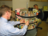 Ron DeClerck looks up the current location of a specific medical record on the Record Locator.