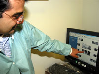 Sunil reviews a dental x-ray